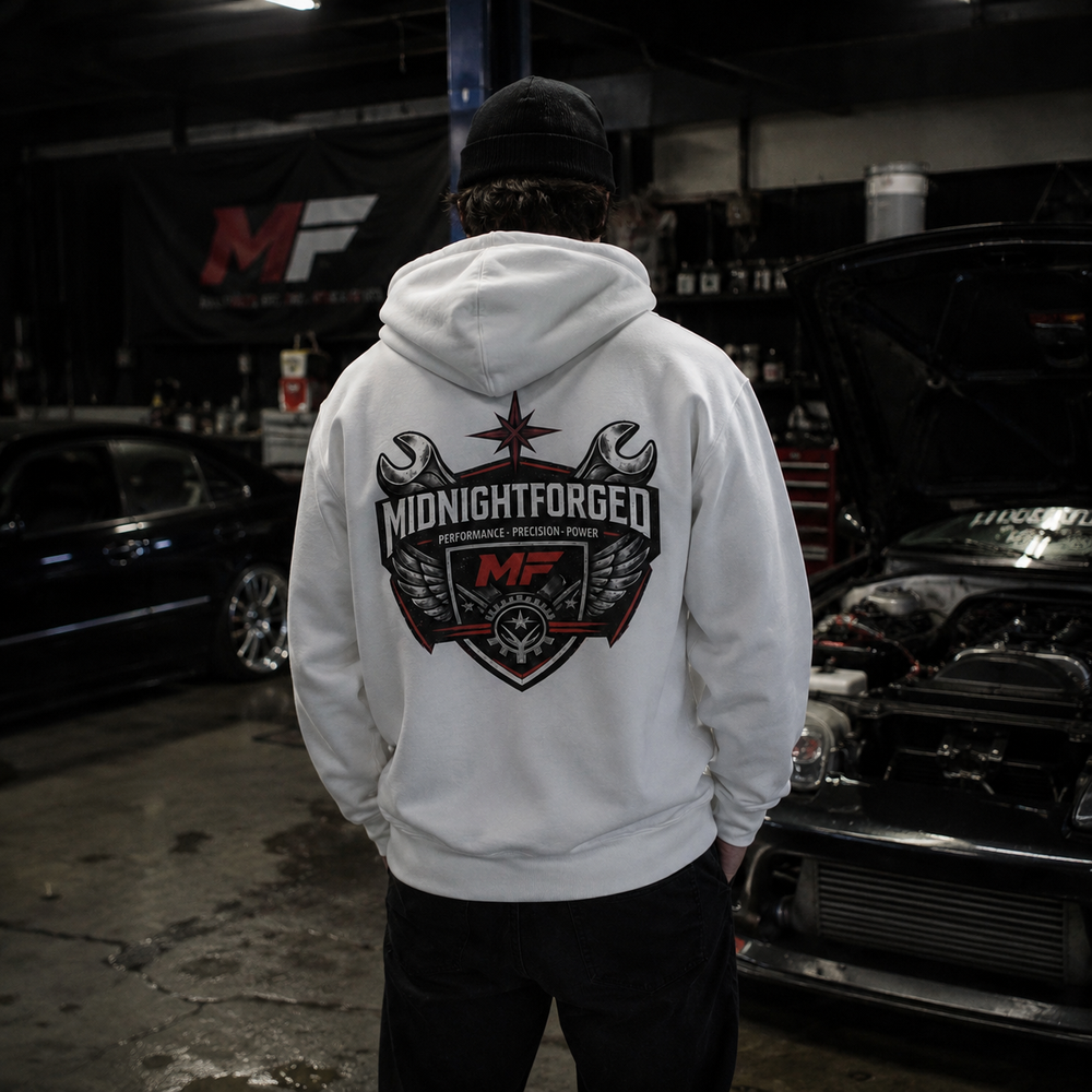 Midnight Forged white hoodie lifestyle photo in automotive garage